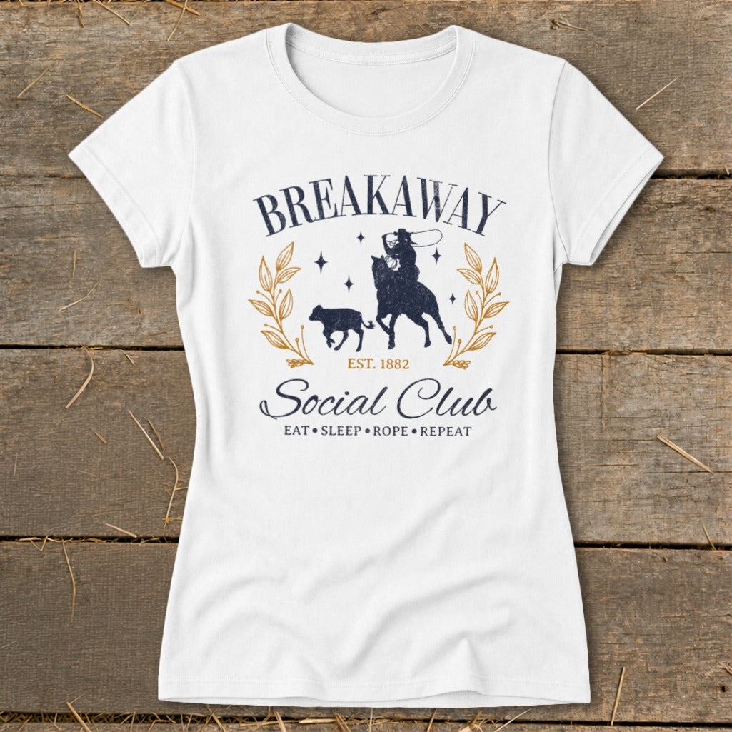 White t-shirt with "Breakaway Social Club" graphic and cowboy roping a calf.