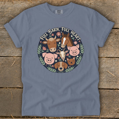 Blue t-shirt with a circular graphic of farm animals and the text "FULL BARN, FULL HEART".