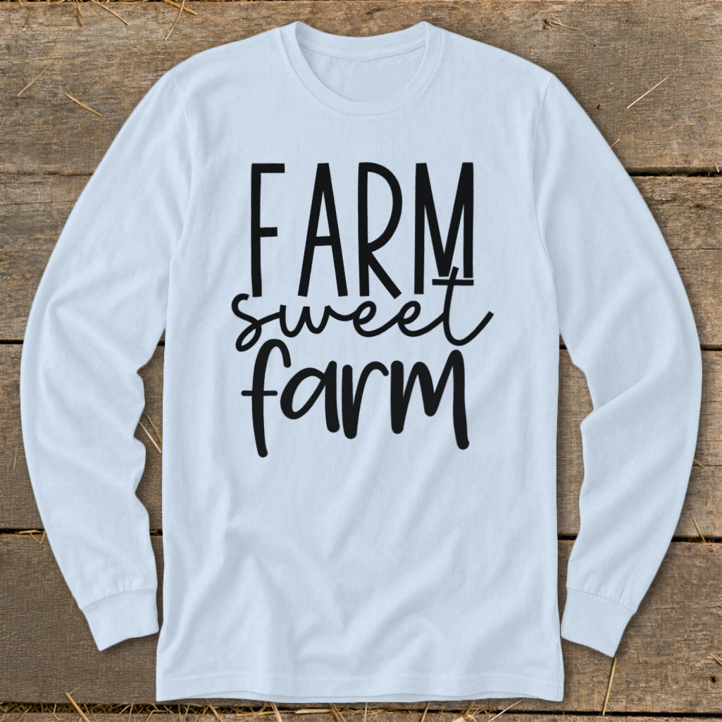 White long-sleeve shirt with "FARM sweet farm" text in black lettering.