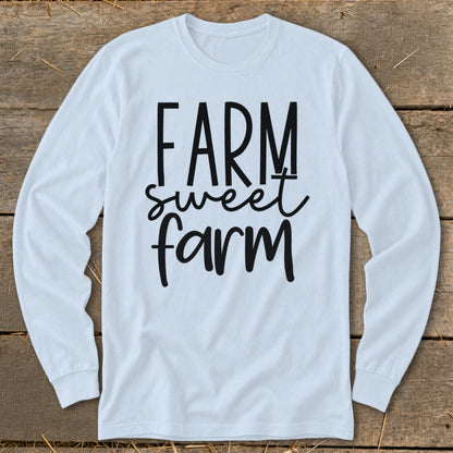 White long-sleeve shirt with "FARM sweet farm" text in black lettering.