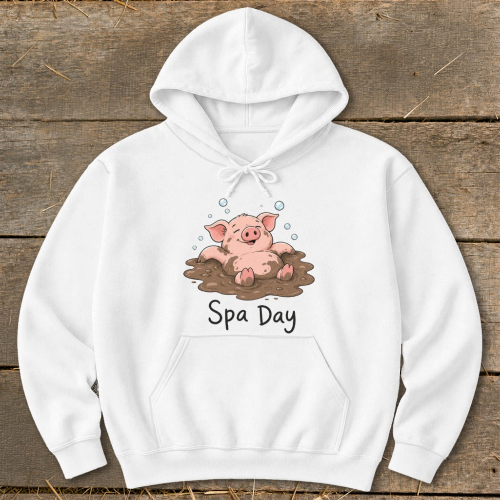 White hoodie with cartoon pig in mud with text "Spa Day".