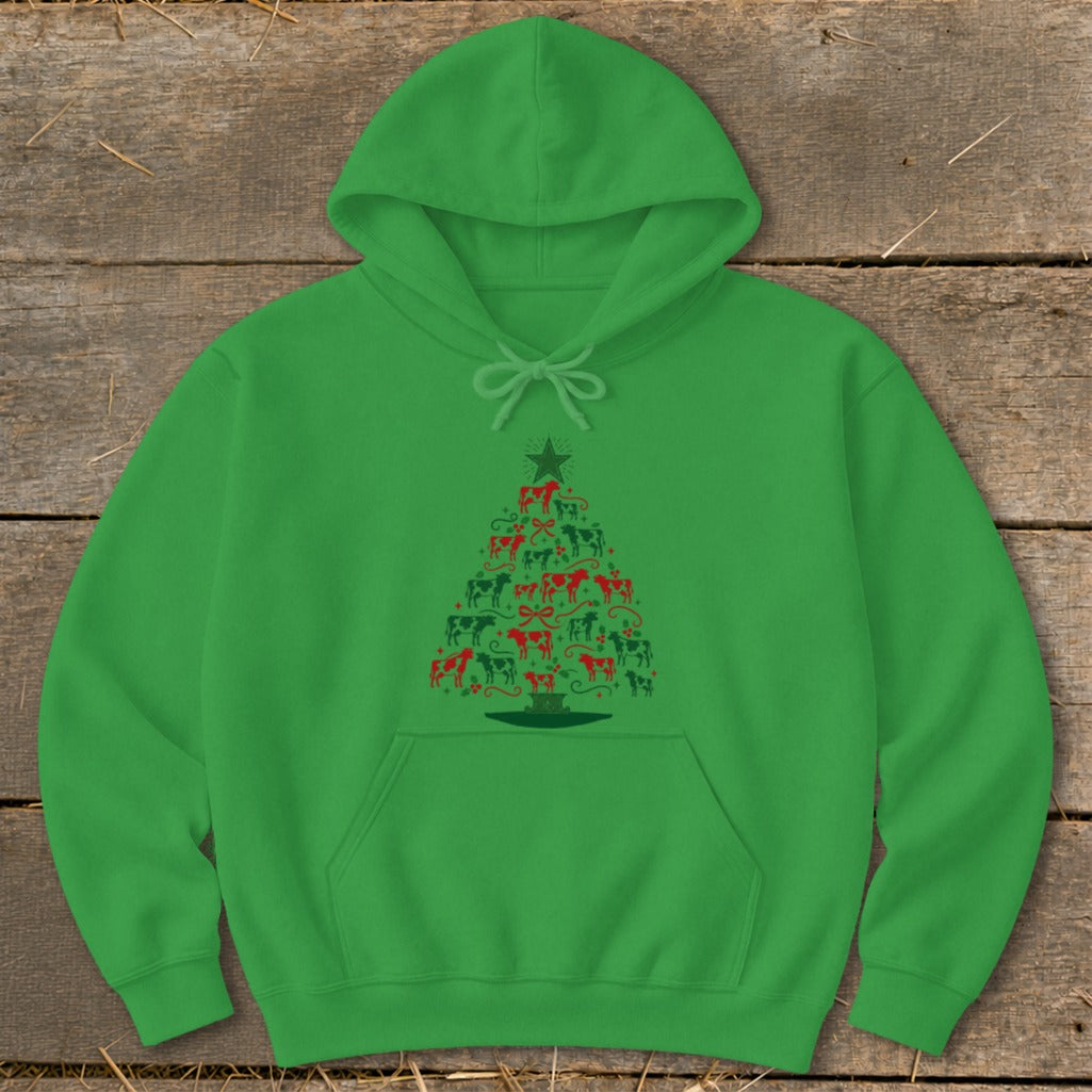 Green hoodie with a Christmas tree made of red and black cows and a star.