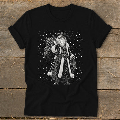 Black t-shirt with a cowboy Santa Claus graphic holding a sack and lasso.
