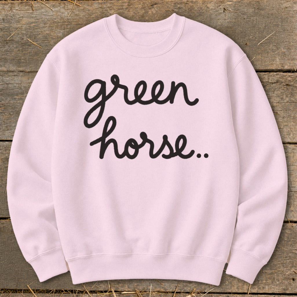 Light pink sweatshirt with "green horse.." in black cursive text.