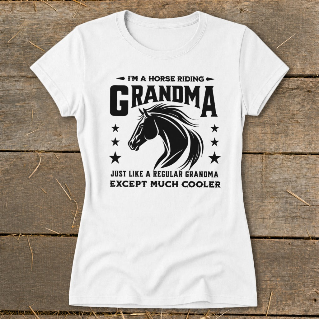 White t-shirt with black graphic of a horse and text: "I'm a Horse Riding Grandma Just Like a Regular Grandma Except Much Cooler".