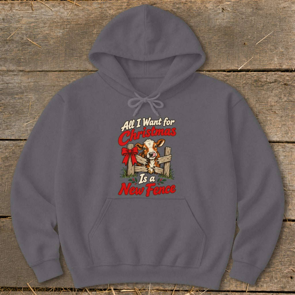 Grey hoodie with Christmas cow graphic saying "All I Want for Christmas Is a New Fence".