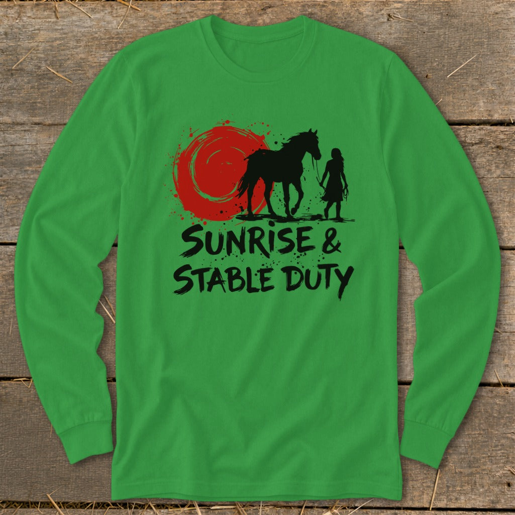 Green long sleeve shirt with horse, person, red sun, and "Sunrise & Stable Duty" text.