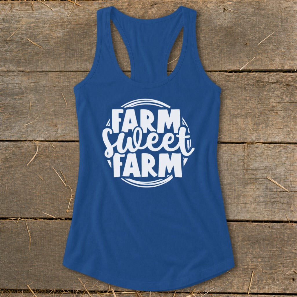 Blue racerback tank top with white "Farm Sweet Farm" text design.