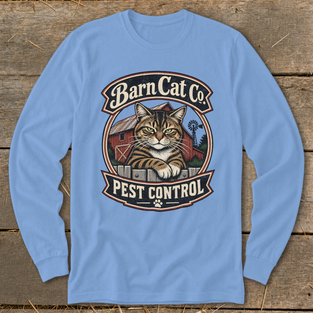 A light blue long-sleeve t-shirt with a Barn Cat Co Pest Control graphic on the chest.