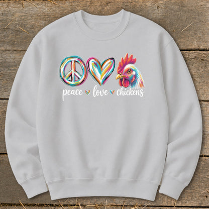 Light grey sweatshirt with "peace love chickens" text and colorful chicken art.