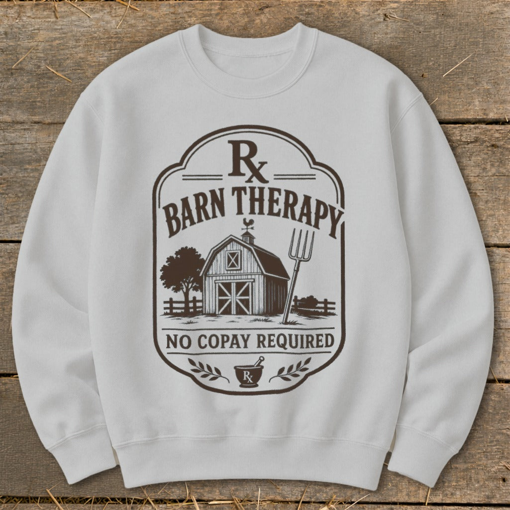 White sweatshirt with "Barn Therapy No Copay Required" text and barn graphic.