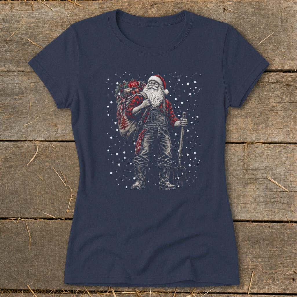 Santa Claus in overalls carrying a sack of gifts and a pitchfork with falling snow.