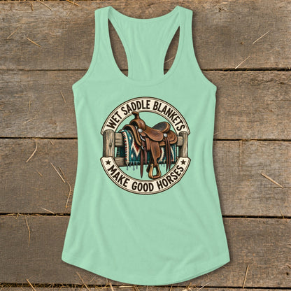 Mint green tank top with graphic "Wet saddle blankets make good horses".