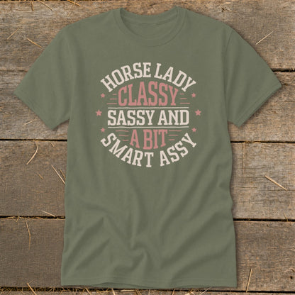Olive green t-shirt with "Horse Lady Classy Sassy and a Bit Smart Assy" text.