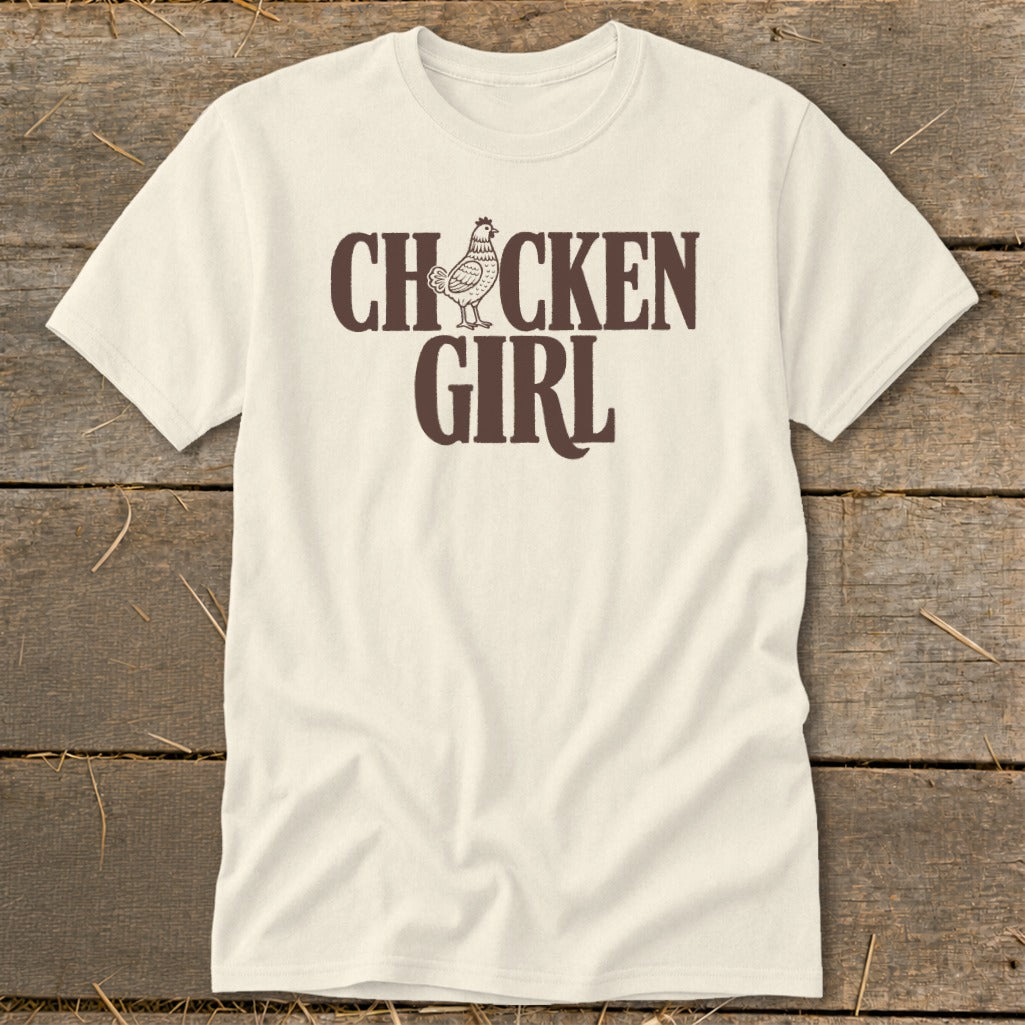Cream t-shirt with "CHICKEN GIRL" text and a chicken graphic.