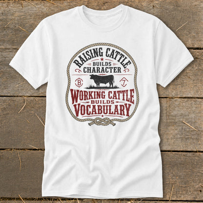 White t-shirt with "Raising Cattle Builds Character" and "Working Cattle Builds Vocabulary" text.