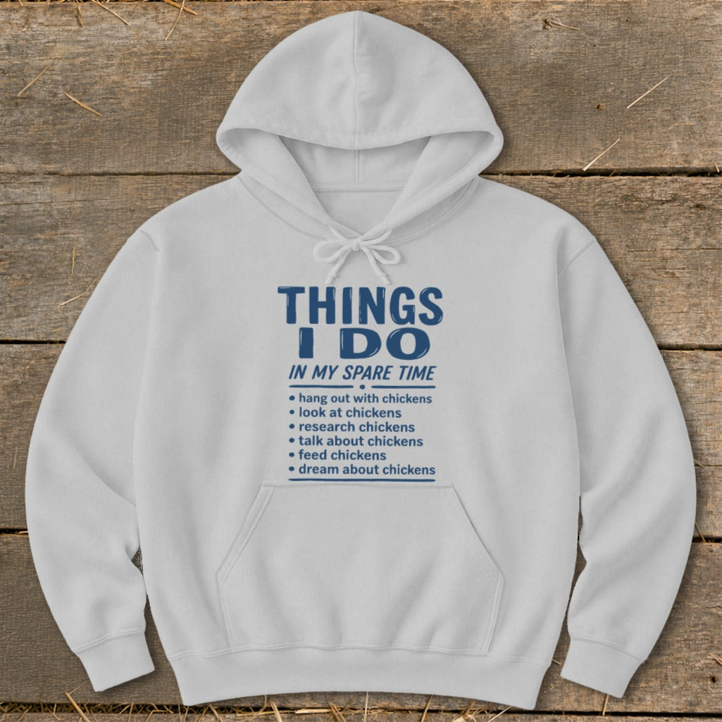White hoodie with blue text listing chicken-related activities.