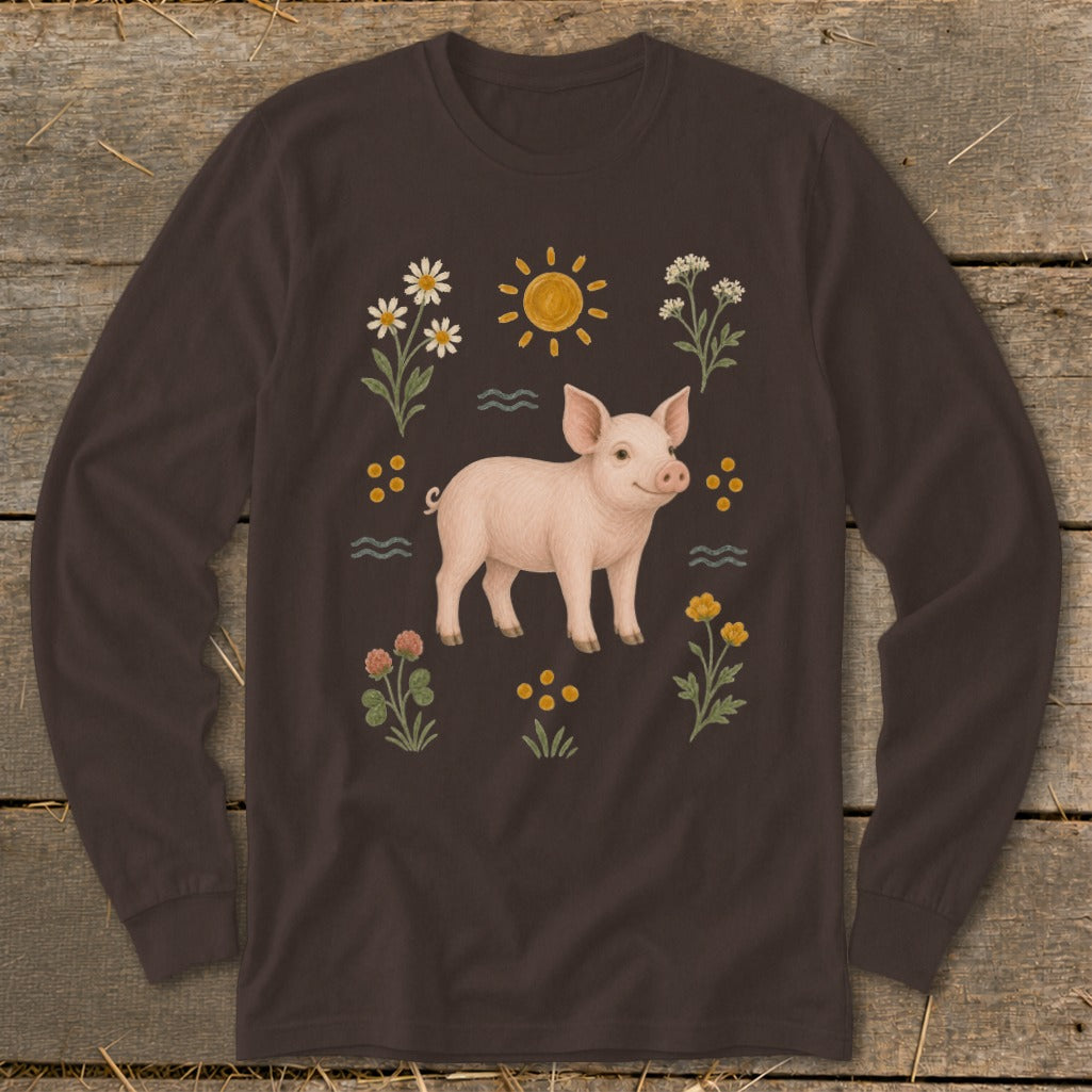 Brown long-sleeve shirt with a cartoon pig and wildflowers design.
