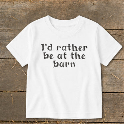 White t-shirt with black text "I'd rather be at the barn".