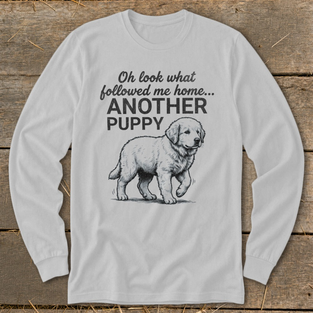 White long-sleeve shirt with graphic of a puppy and text "Oh look what followed me home... ANOTHER PUPPY".