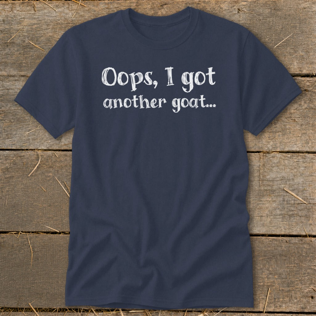 Navy t-shirt with white text that reads "Oops, I got another goat..."