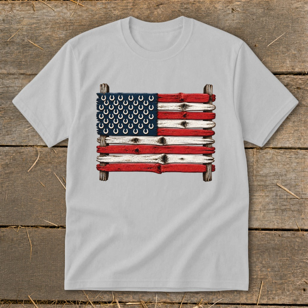 Light gray t-shirt featuring a rustic American flag made of painted wooden planks and horseshoes.