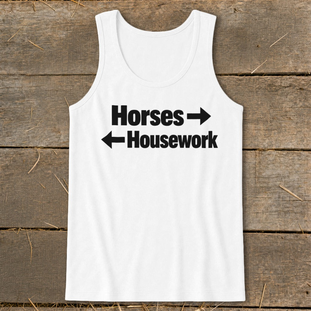 A white tank top featuring black text that reads Horses with a right arrow and Housework with a left arrow.