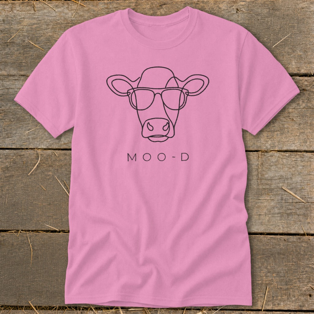 Pink t-shirt with line art of a cow wearing glasses and the text "MOO-D".