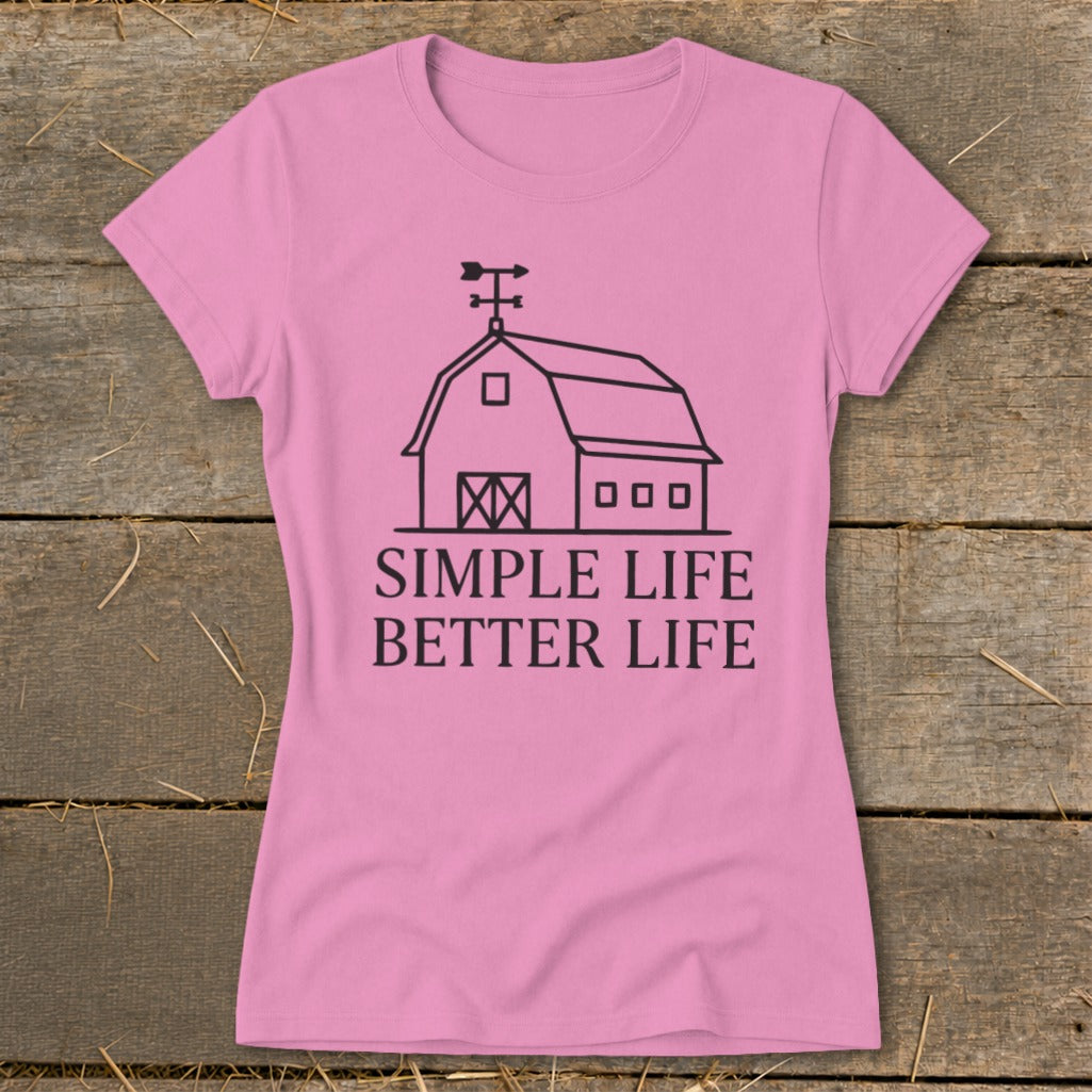 Pink t-shirt with barn graphic and text "SIMPLE LIFE BETTER LIFE".