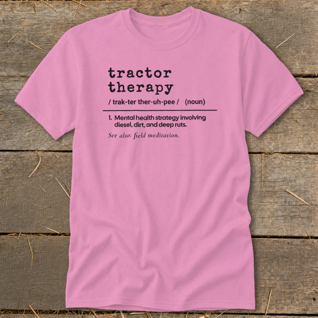 Pink t-shirt with "tractor therapy" definition: mental health strategy involving diesel, dirt, deep ruts.