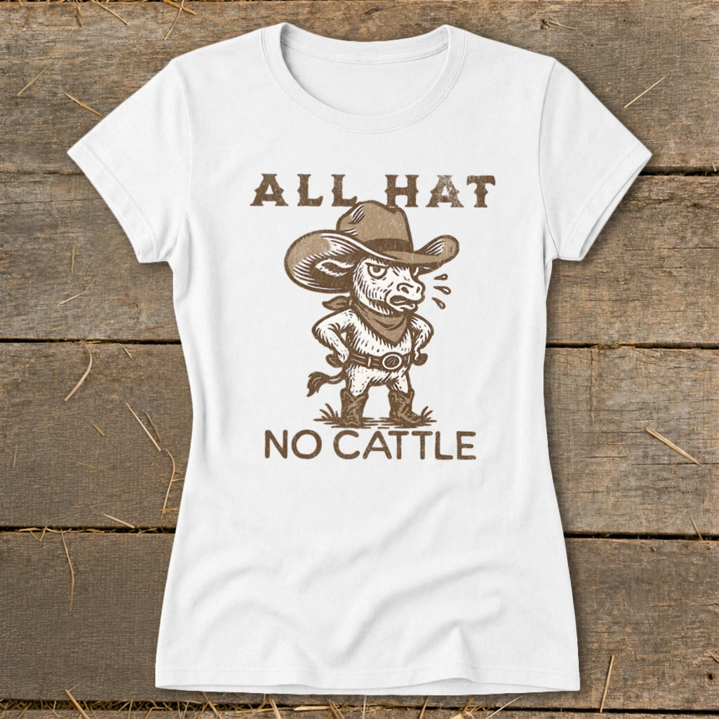 White t-shirt with brown illustration of a bull wearing a cowboy hat and bandana, text "ALL HAT NO CATTLE".