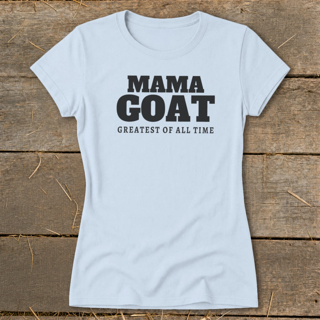 Light blue t-shirt with black text "MAMA GOAT GREATEST OF ALL TIME"