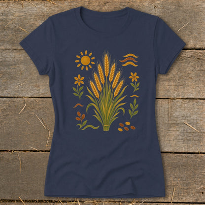 Navy t-shirt with a central illustration of wheat stalks, sun, flowers, and seeds.