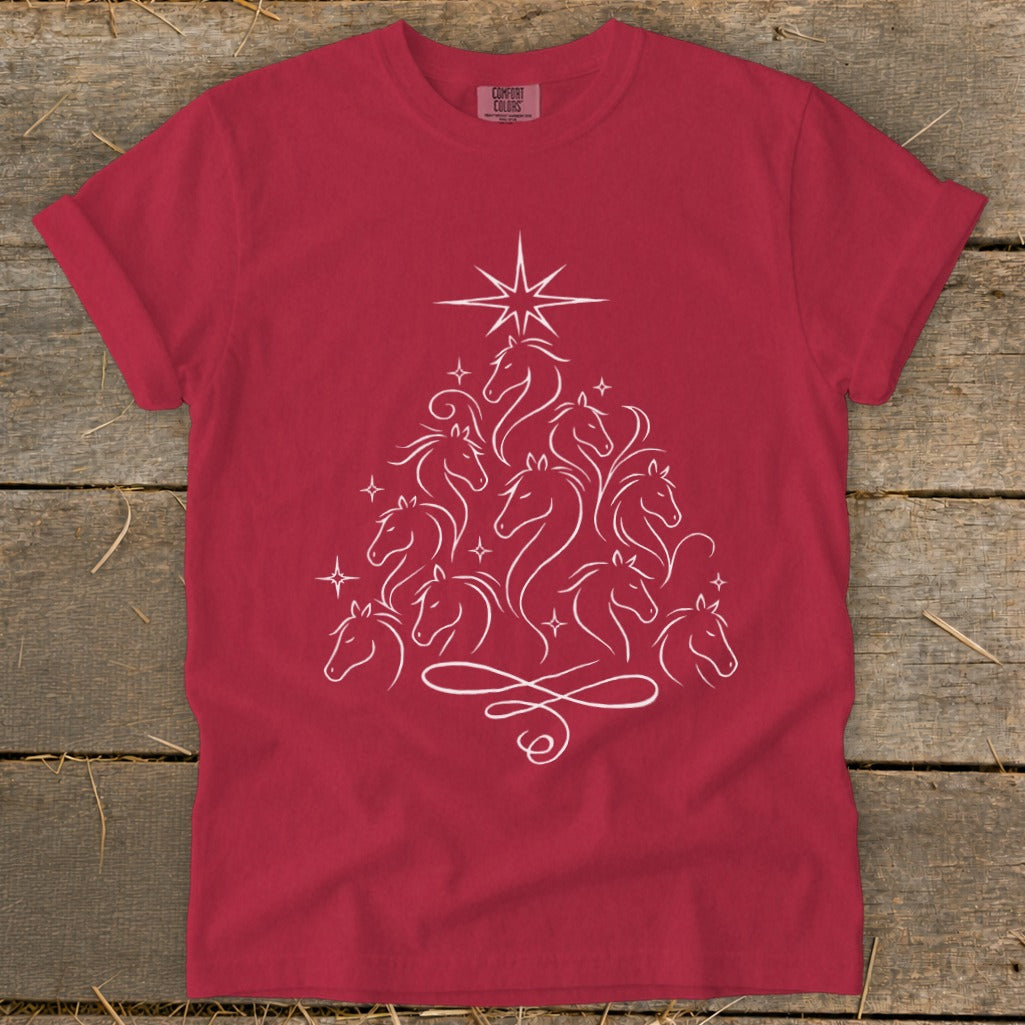 Red t-shirt with white line art of horses forming a Christmas tree.