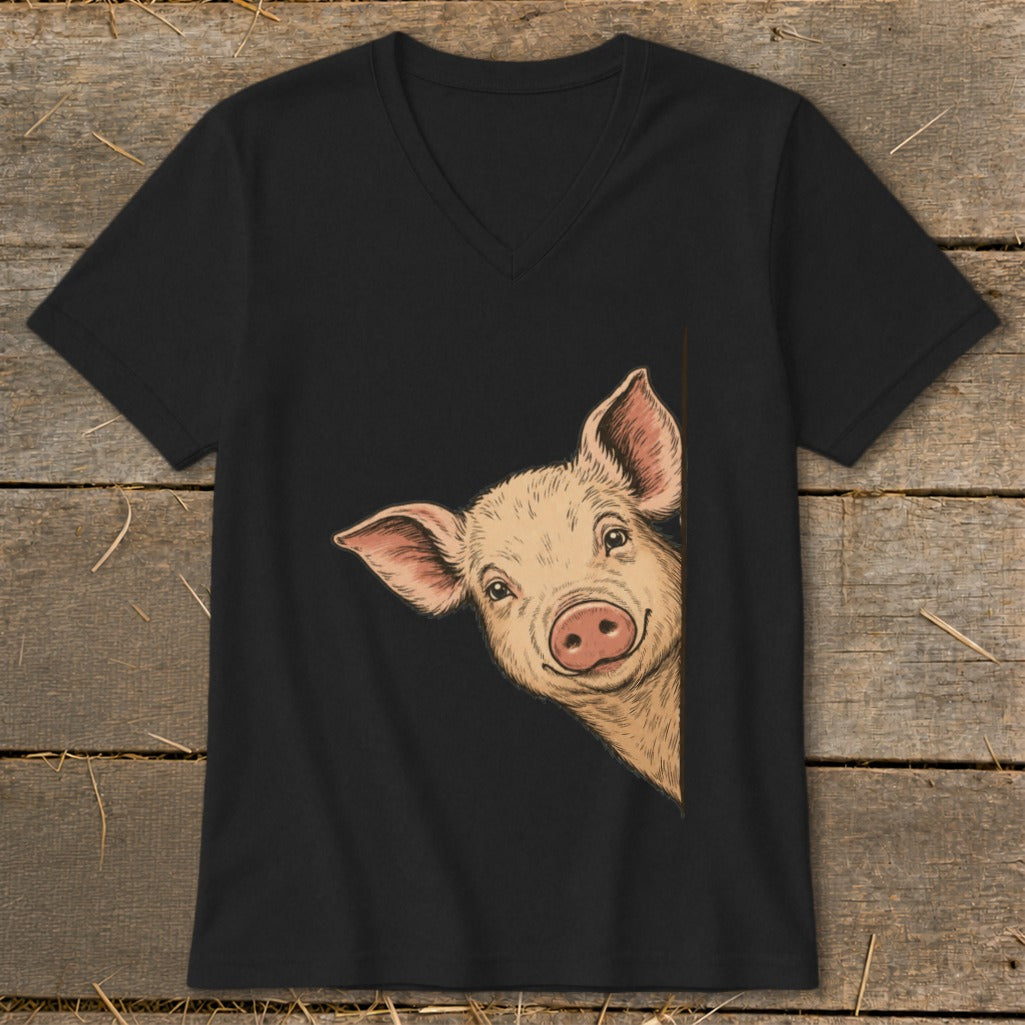 Black t-shirt with a drawing of a smiling pig peeking from the side.