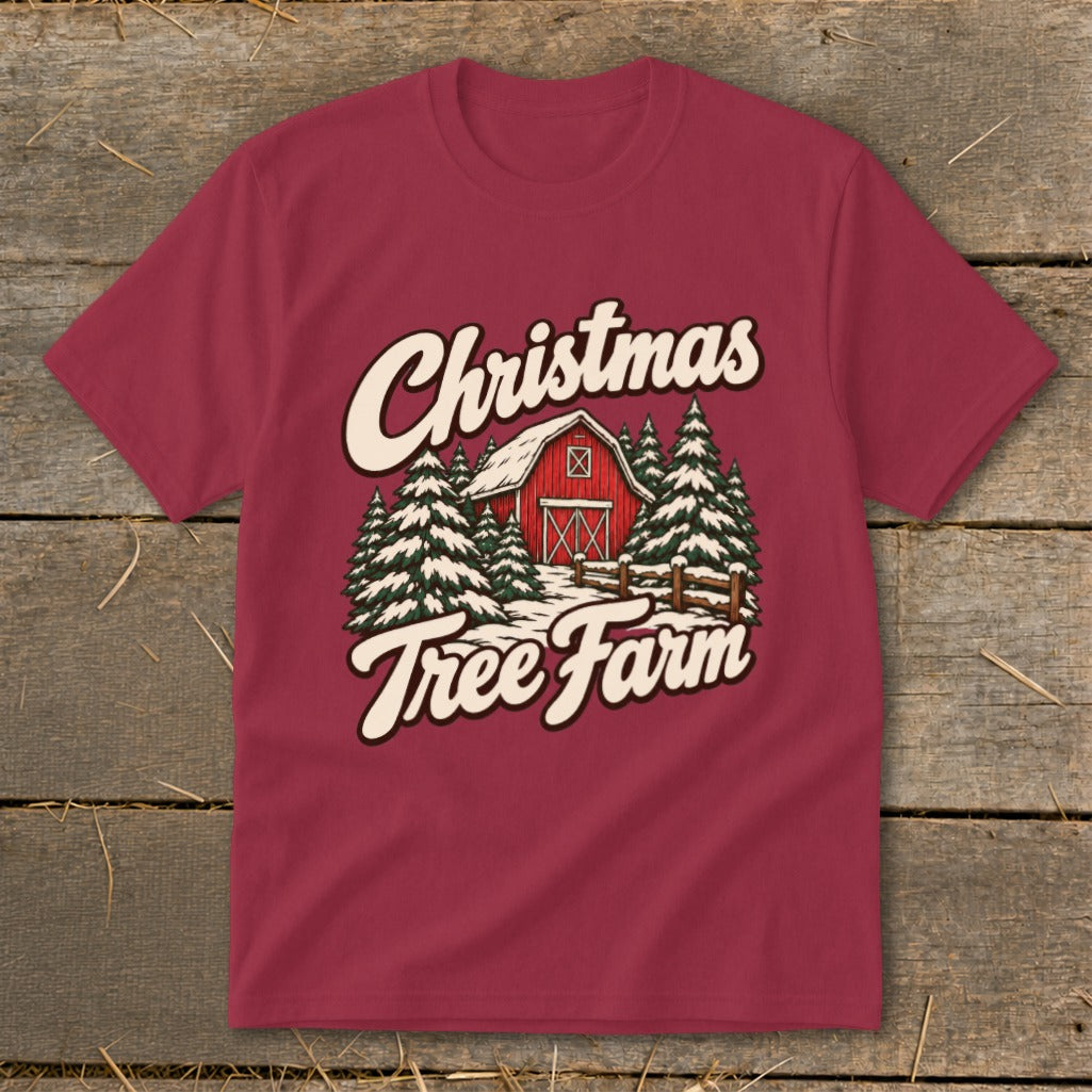 Maroon t-shirt with "Christmas Tree Farm" text over a red barn and snowy trees.