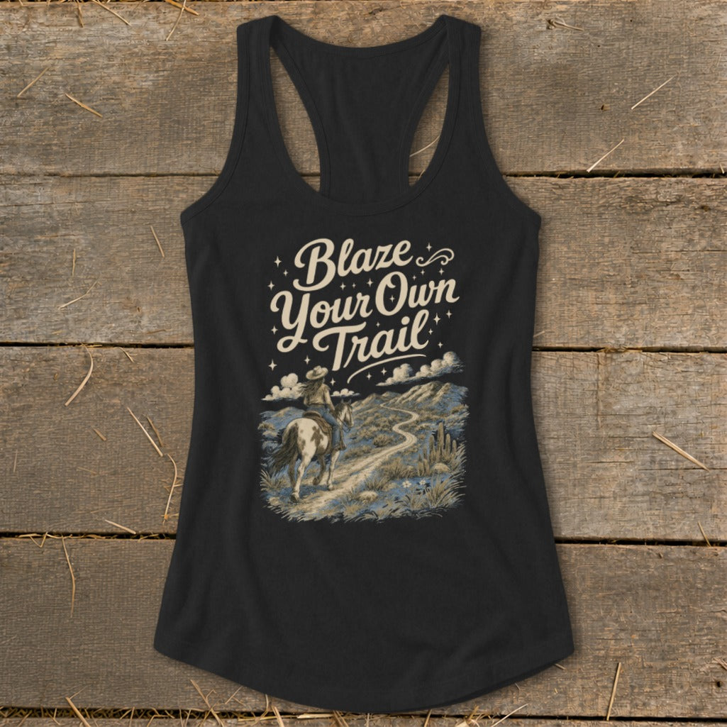 Black tank top with "Blaze Your Own Trail" text and cowboy on horseback.