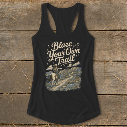 Black tank top with "Blaze Your Own Trail" text and cowboy on horseback.