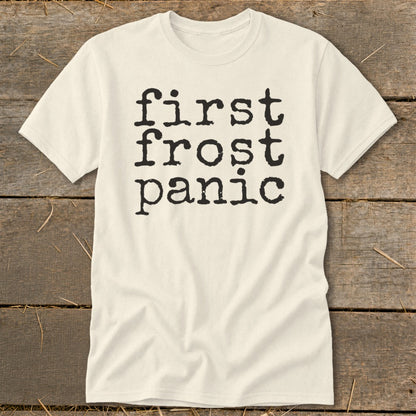 Cream t-shirt with black typewriter text that reads "first frost panic".