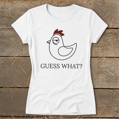 White t-shirt with a cartoon chicken graphic and the text "GUESS WHAT?".