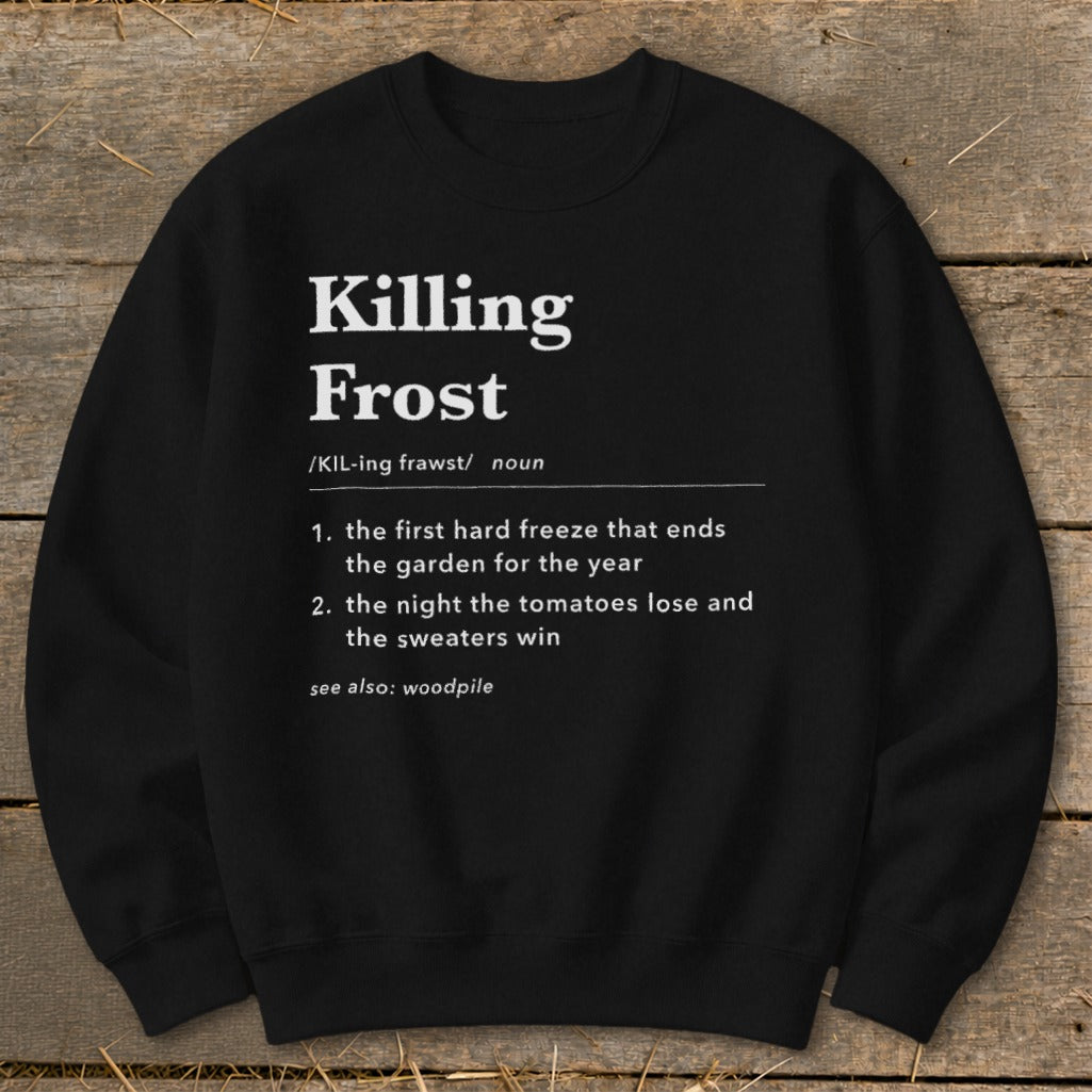 A black crewneck sweatshirt with a white dictionary-style definition graphic centered on the chest.