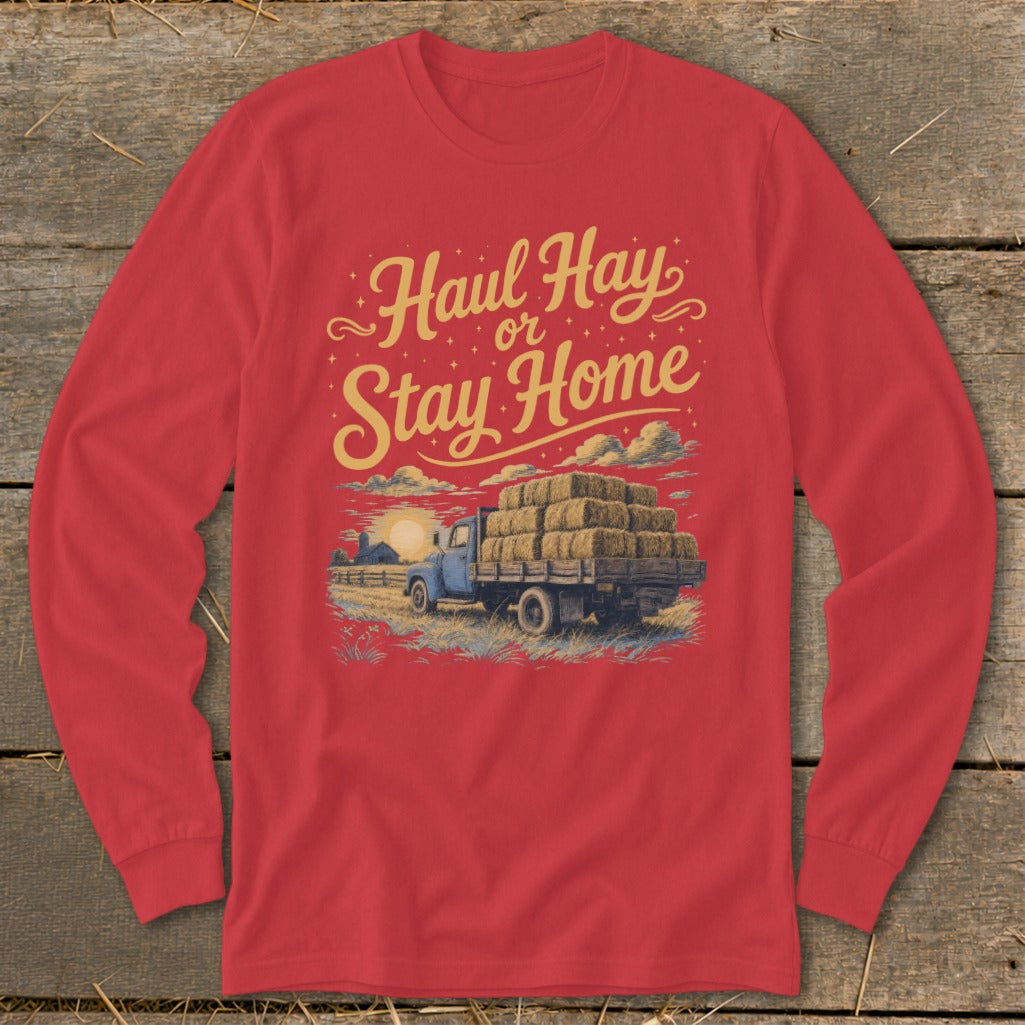 Red long-sleeve shirt with "Haul Hay or Stay Home" text and truck loaded with hay.