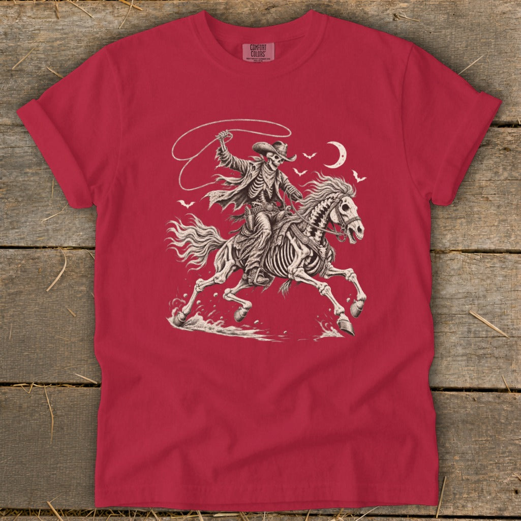 Skeleton cowboy on a horse with a lasso and moon, on a red shirt.