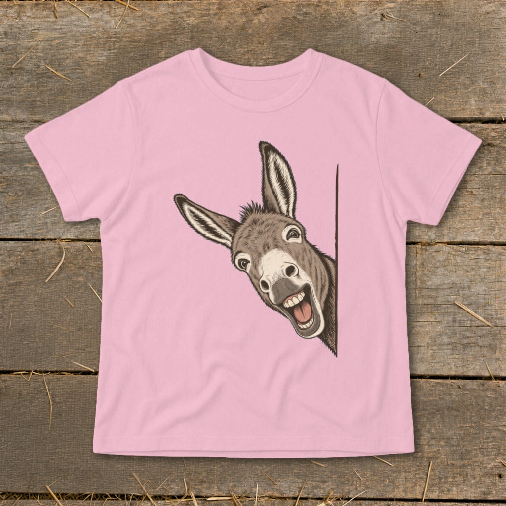 Pink t-shirt with a cartoon donkey peeking around a corner with a wide smile.