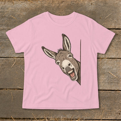 Pink t-shirt with a cartoon donkey peeking around a corner with a wide smile.