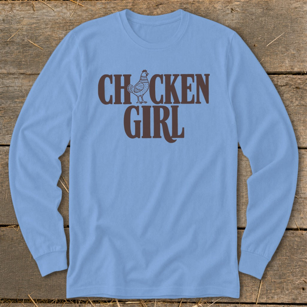 Light blue long-sleeve shirt with brown "CHICKEN GIRL" text and a chicken graphic.