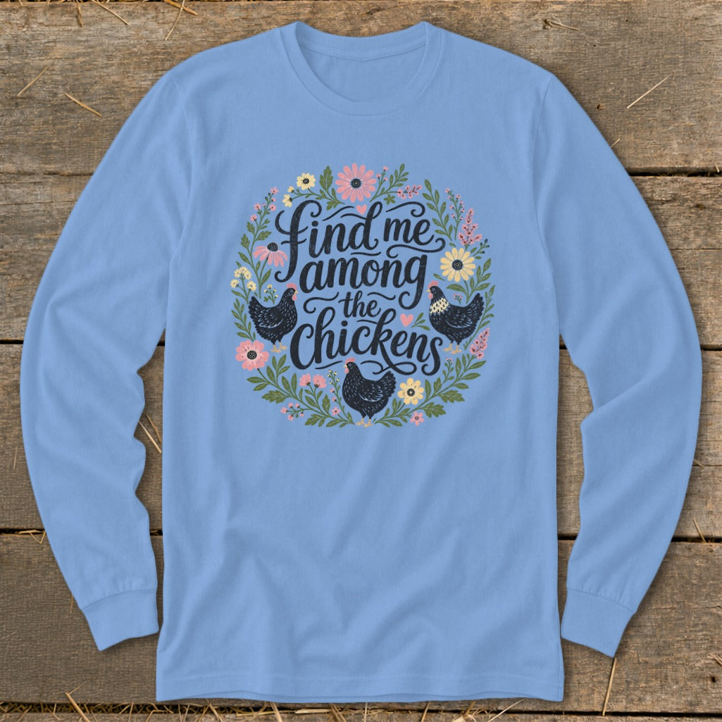 Light blue long-sleeve shirt with chickens and flowers graphic saying "Find me among the chickens".