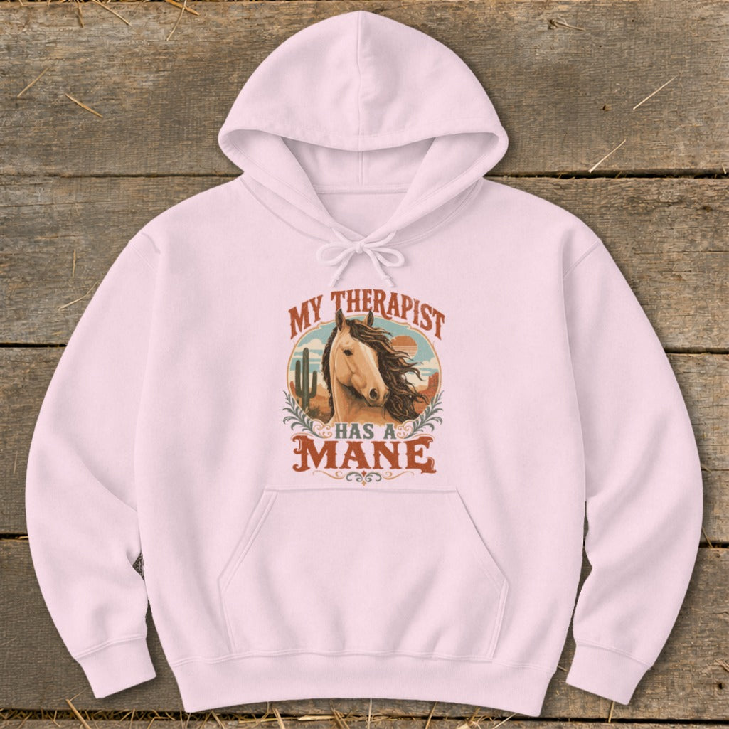 Pink hoodie with "My Therapist Has a Mane" text and horse graphic.