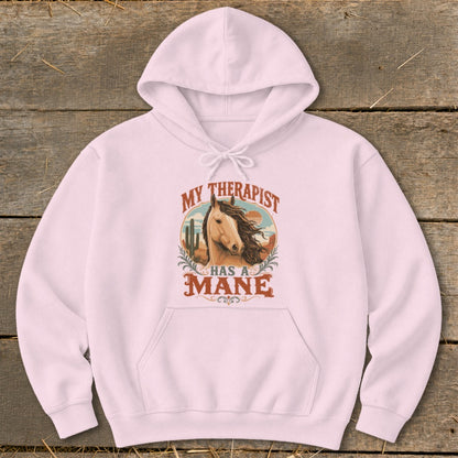 Pink hoodie with "My Therapist Has a Mane" text and horse graphic.