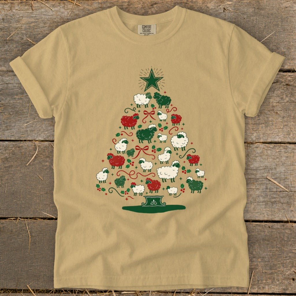 Tan t-shirt with Christmas tree made of white and green sheep with red bows.